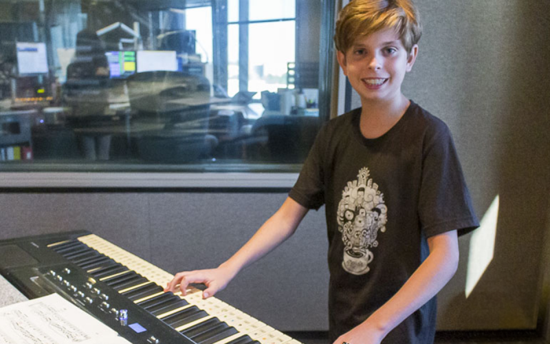 12-year-old pianist, Liam Tucker in the KBACH studios